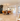 Conical pendant light in plated brass finish for ambient lighting in hallways, bedrooms, or stylish cafés