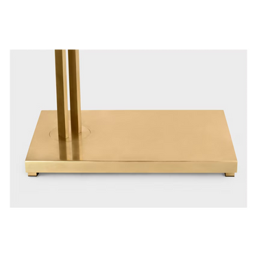 Close-up of the integrated LED light source and slim body of the Stagger brass floor lamp.
