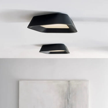 Rhonan black LED flush mount light with acrylic diffuser for ambient lighting in modern interiors