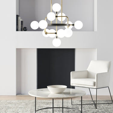Contemporary chandelier with brass arms and opal glass shades for upscale home or office lighting