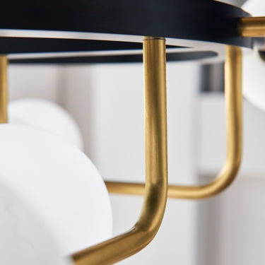 12-light LED chandelier with opal glass and brass arms, ideal for modern kitchens or commercial settings