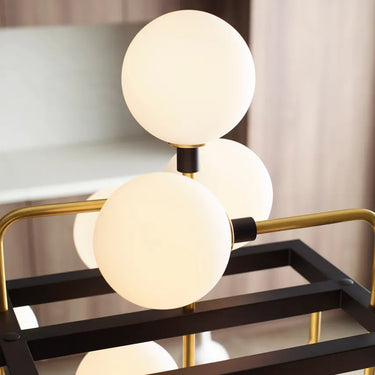 56-inch modern chandelier with brass hardware and opal globe shades, perfect for luxury interiors