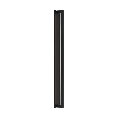 Mick De Giulio Stagger minimalist outdoor wall light with concealed LED strip casting indirect glow on a building exterior.