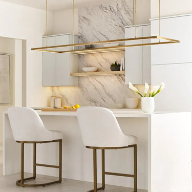 Long natural brass LED suspension light fixture for high ceiling residential interiors and modern homes