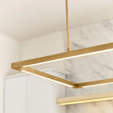 84 inch modern brass LED linear light over kitchen island in luxury home design