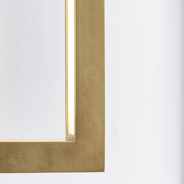 Brass wall sconce with warm 2700K LED light, designed for residential and commercial wall installations