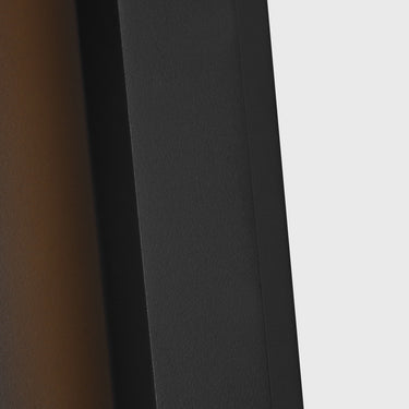 Backplate-mounted LED wall light designed for wet locations in luxury homes and commercial buildings