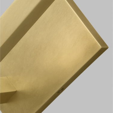 Contemporary brass LED sconce with vertical installation for residential entryways or hotels
