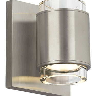 Satin Nickel Voto round LED wall light, horizontally mounted above a bathroom vanity, providing ADA compliant lighting.
