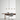 Black Wit linear suspension, 6 glass, installed in a modern conference room setting.
