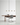 Black Wit linear suspension, 6 glass, installed in a modern conference room setting.
