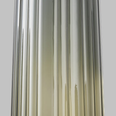 Zenith LED pendant with Smoke ribbed glass shade for bedrooms: An in-situ photo showing the light over a bedside table, creating a soft, ambient glow.