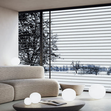 Modern Volum LED lamp by Lodes featuring blown-glass pebble-shaped diffuser and silicone base