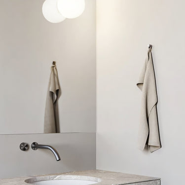 Hand-blown white glass sphere wall light Volum by Snøhetta for Lodes, elegant modern interior lighting