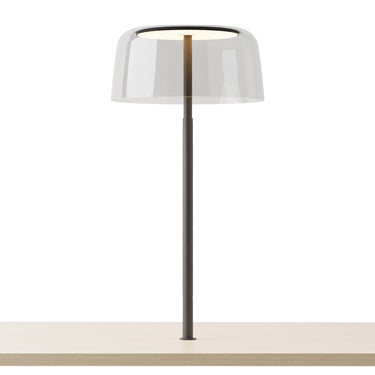 Modern LED desk lamp with through-table mount, soft diffused lighting, and eco-friendly recycled materials