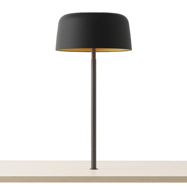 Contemporary through-table LED lamp with USB-C charging port and adjustable height for shared workspaces