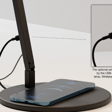 Matte black Tunable white LED lamp for ergonomic desk setups in bedrooms and workspaces with wireless table base charger