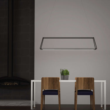 Koncept Z-Bar Rise Rectangle LED Pendant in Matte Black over a modern dining table.