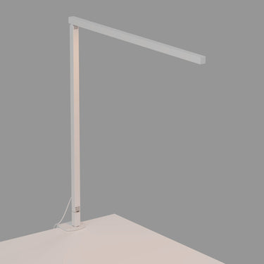 Minimalist adjustable LED desk lamp with USB-C charging port