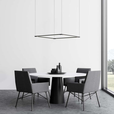 Matte Black Z-Bar modular square LED pendant light installed over a modern office lounge table.