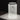 Designer table lamp by Artemide with polished aluminum ring and clear glass