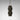 Ring pendant in bronze with stacked metal rings on a black silk braided flex, studio view
