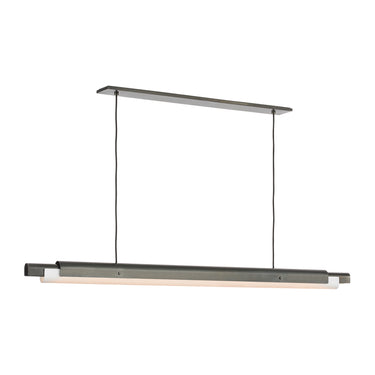 Visual Comfort Ambrose 72" long rectangular chandelier illuminating a stylish home office desk.
