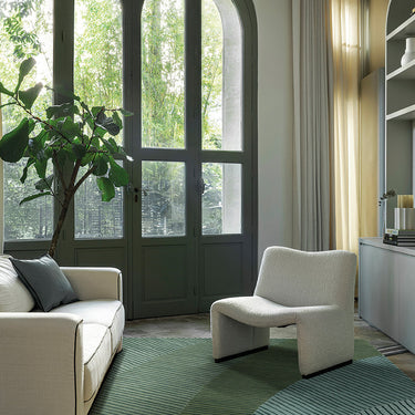 Ammonite wool rug in Abysse, styled in a room