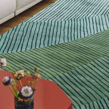 Ammonite wool rug in Abysse, full view