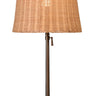 Cordless rattan table lamp with dark brass metal base for modern interiors