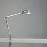 Artemide Tolomeo Classic LED clamp lamp with motion sensor in aluminum