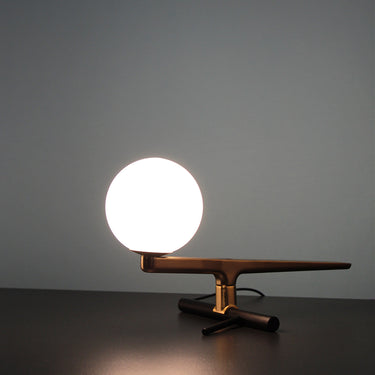 Artemide Yanzi Table Lamp with illuminated opal glass diffuser