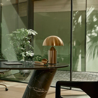Medium size Atollo Gold table lamp with dimmable LED light