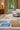 Bleu des Yeux wool rug in Multi, styled in a room