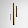 Three Artes wall lights in different lengths in bronze, with alabaster diffusers, studio view