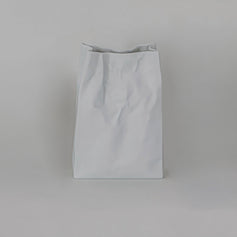 Empty, showing the crumpled paper-bag folds · Crinkle Vase, Ceramic Japan (view 1)