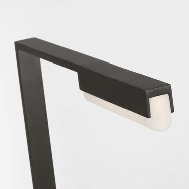 Modern 15-inch Linea table lamp featuring thin metal channels and glowing alabaster, ETL listed for safety