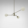 Trevi pendant in bronze with 3 matt opal glass globes on slim arms, studio view