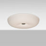 Nimbus 16 opal glass flush mount, glowing | Besa Lighting