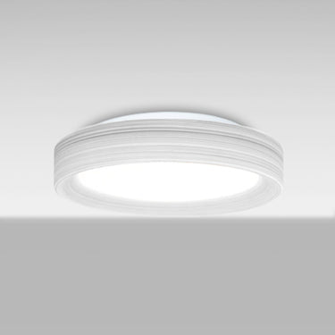 Pella 13 in Chalk, glowing from below | Besa Lighting
