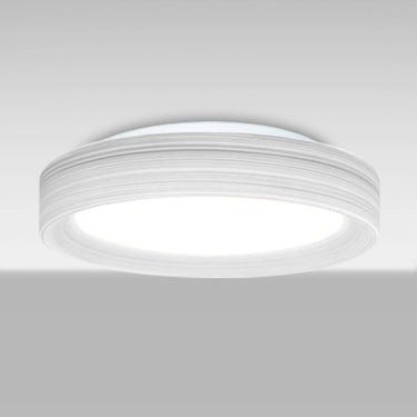 Pella 16 in Chalk, glowing from below | Besa Lighting