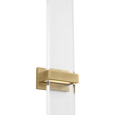 Modern Flyta LED wall sconce in natural brass, ideal for contemporary bathrooms.
