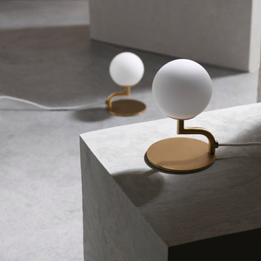 Globe table lamp, Brass and Opal, studio view | Mobil by Pholc