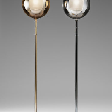 Penta Glo floor lamp studio shot showing the glass sphere and metal stem