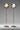 Penta Glo floor lamp studio shot showing the glass sphere and metal stem