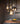 Penta Glo glass sphere pendant lit in an interior