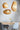 Scraplights Pebbles over a dining table with the tall Denny shade