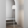 Modern reading corner illuminated by the Lodes Hover floor lamp