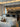Penta Lit pendant lights hanging over a table