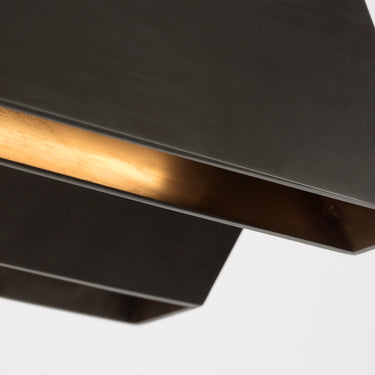 Long linear brass chandelier, 42 inches, sloped ceiling adaptable, ideal for contemporary commercial projects.